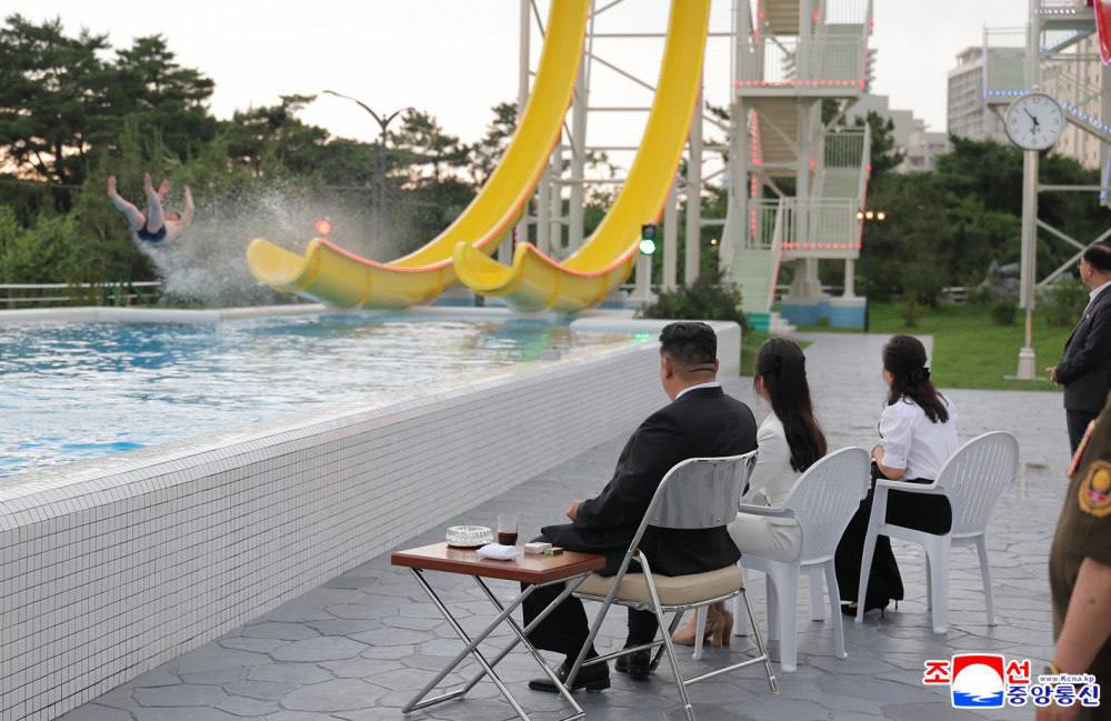 0735GMT//North Korea's Kim opens waterpark for Russians; a hidden banking debt crisis lurks